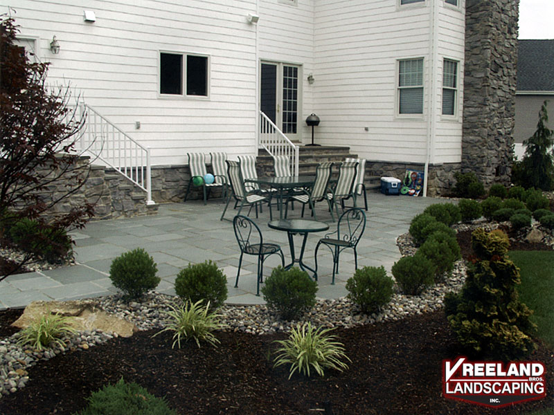 Oak Ridge, NJ, Blue stone masonry patio with plantscape 