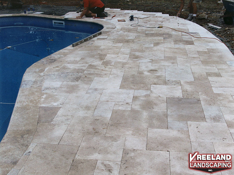 Stockholm, NJ, Custom masonry patio with bullnose coping around pool 