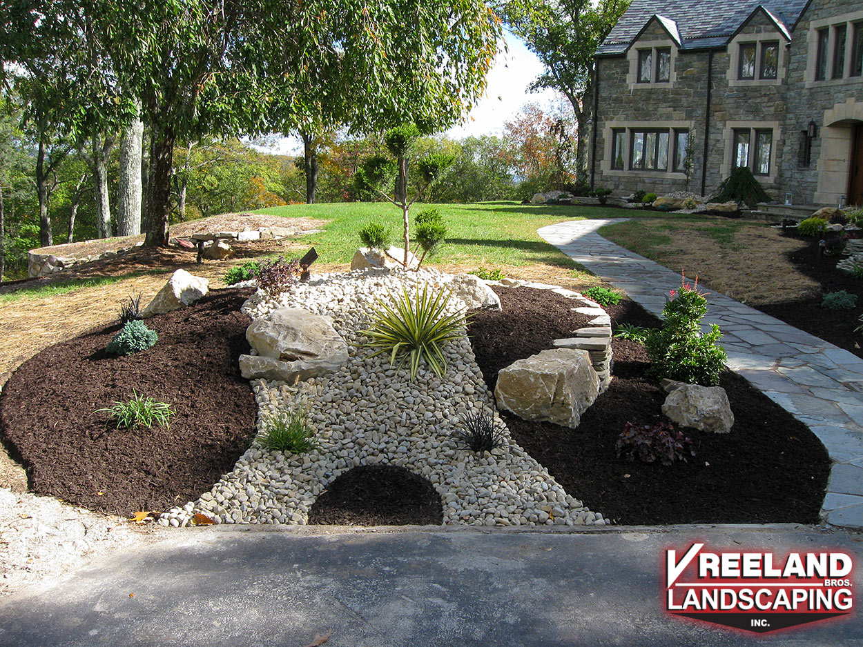 Kinnelon, NJ, Newly installed rock garden, new plantings, and fresh mulch. 