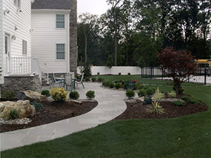 Oak Ridge, NJ - Blue stone masonry walkway, with patio and plantscape - Vreeland Brothers Landscaping