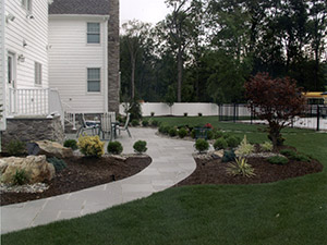 Oak Ridge, NJ - Blue stone masonry walkway, with patio and plantscape - Vreeland Landscapes