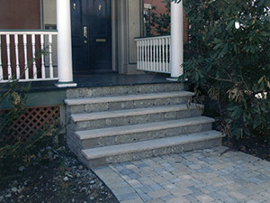 Boonton, NJ - Custom masonry steps tied to existing porch, with paver walkway - Vreeland Landscapes